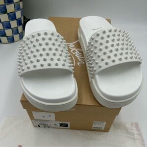SOLD!!!!!Men’s Christian Louboutin studded pool slides size 45 meeting in Italy.